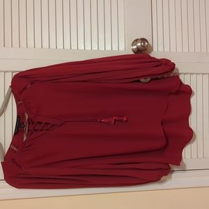 White House Black Market dark red top Size 4. Long bell sleeves and tassel tie